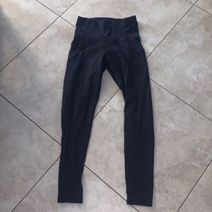 High waisted Black Athleta Leggings with side pockets!
